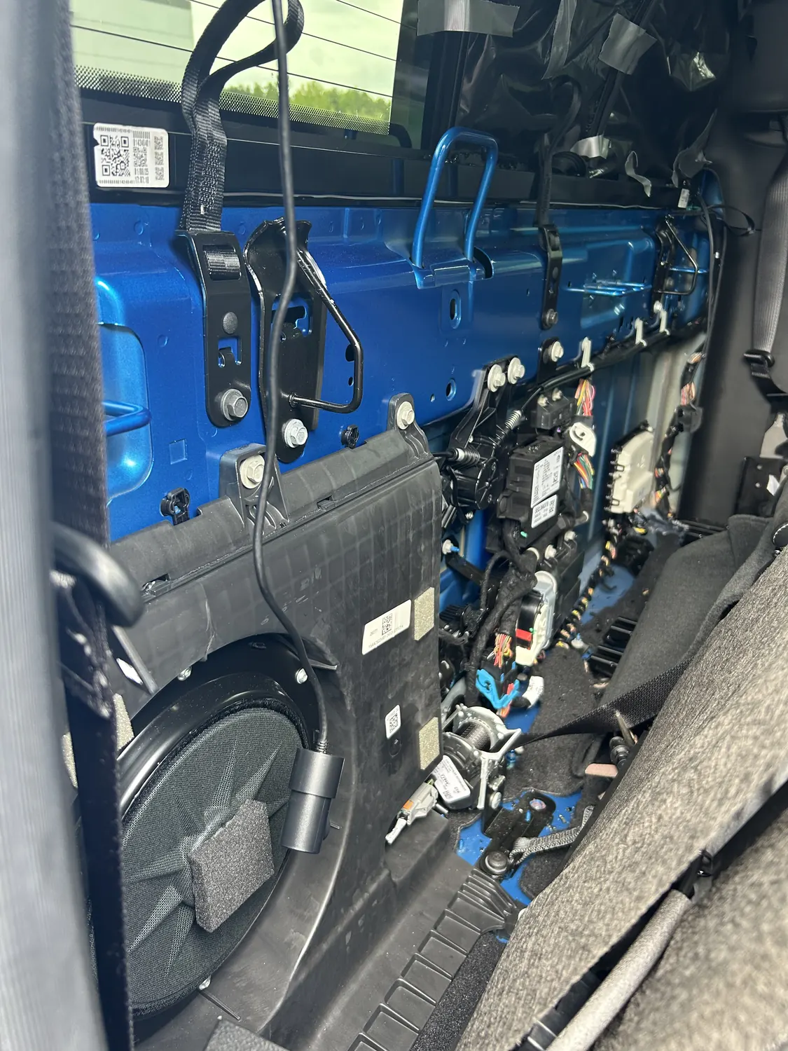 Work pickup with toolboxes and ladder rack after a back glass replacement