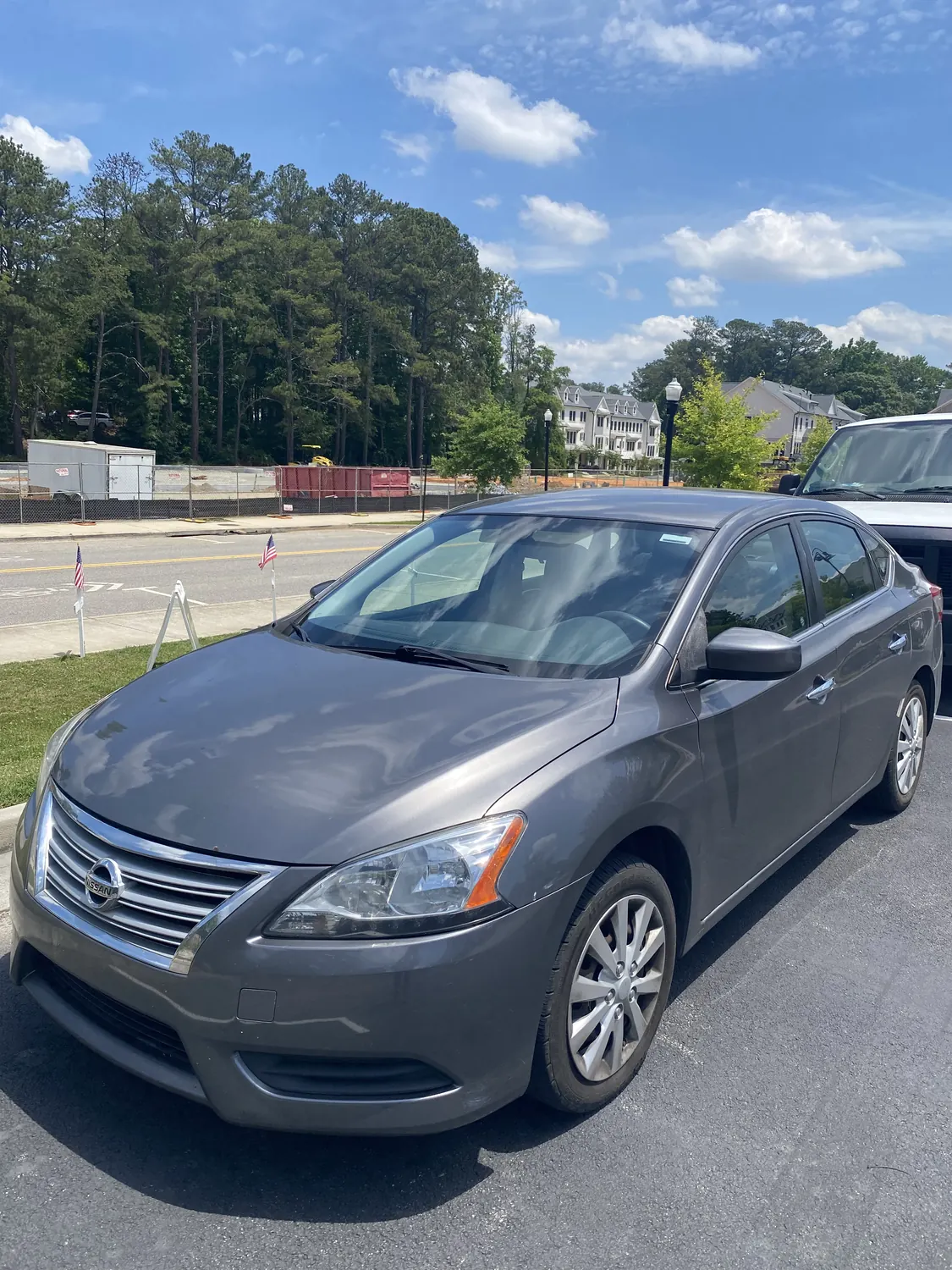 Gray sedan after a mobile windshield replacement