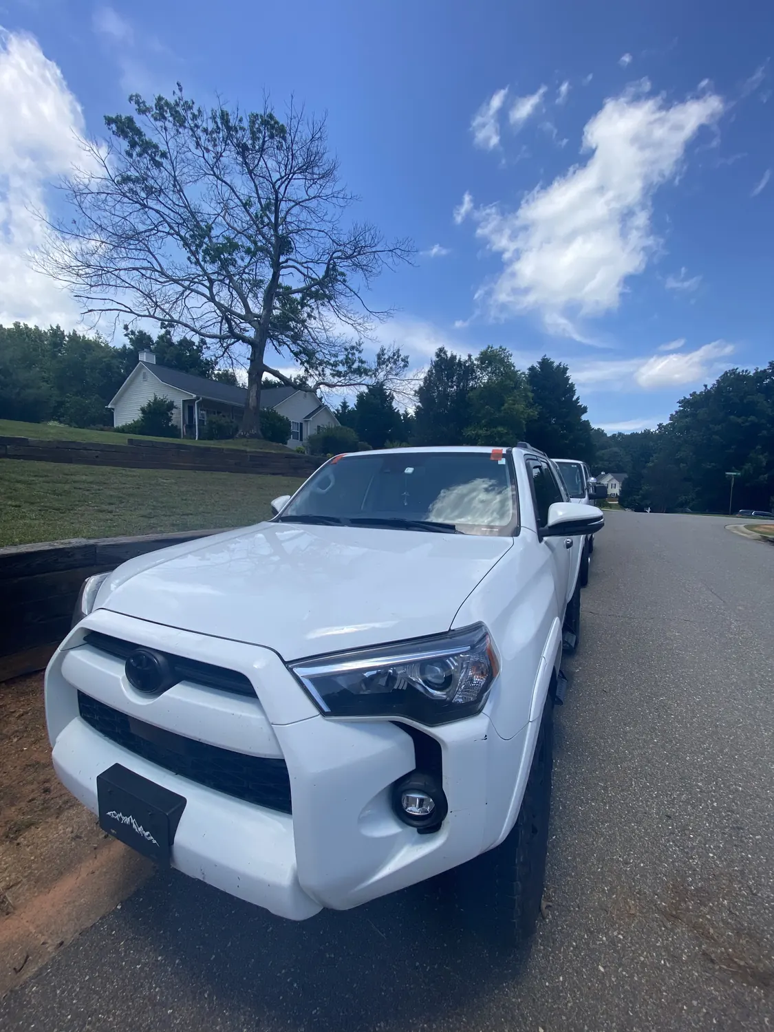 White Toyota 4Runner windshield replacement, front view