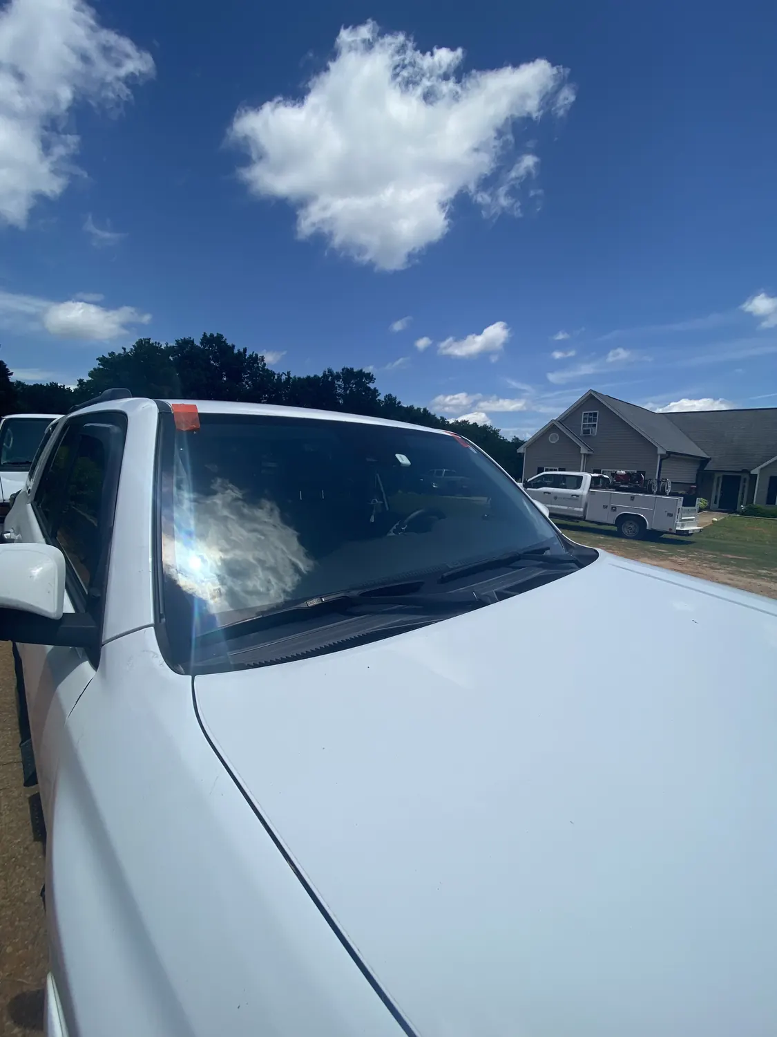 White SUV windshield replacement, front view